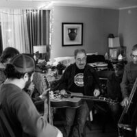 Hotel room jamming at the 2018 Joe Val Bluegrass Festival - photo © Tara Linhardt