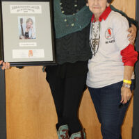 Louisa Branscomb with Mae Hinton and her 2018 Alabama Bluegrass Hall of Fame induction - photo by Sharon Camp