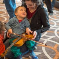 Littlest fiddler at the 2018 DC Bluegrass Festival - photo by Jeromie Stephens