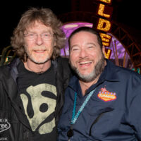 Sam Bush poses with festival staff at the 2018 Bender Jamboree - photo © Erik Kabik