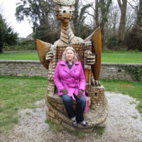 Lisa Kay Howard with East Of Monroe in the dragon chair at  castle they visited in Ireland (April 2018)