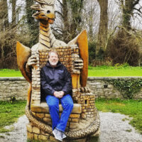 Billy Budd with East Of Monroe in the dragon chair at  castle they visited in Ireland (April 2018)