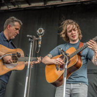 Bryan Sutton and Billy Strings at DelFest 2018 - photo by Brady Cooling