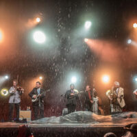 Bluegrass Congress performs in a downpour at DelFest 2018 - photo by Brady Cooling
