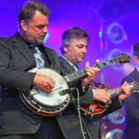 Rob McCoury, Ronnie McCoury, and Alan Bartram at DelFest 2018 - photo by Stuart Dahne