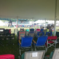 Early birds set up chairs at Jenny Brook 2018 - photo by Darcy Cahill