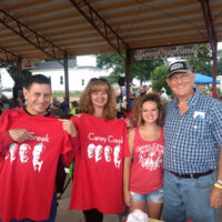 Sportin' Caney Creek t-shirts at Mitch and Cindy's Bluegrass Jamboree - photo by Chris Smith