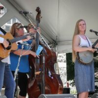 Eleanor Bright Kurita sits in with The Dismembered Tennesseans at Bluegrass on the Grass 2018 - photo by Frank Baker
