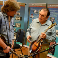 Bobby chats with a student at the 2018 Bobby Osborne Mandolin Roundup - photo by Terry Vaught