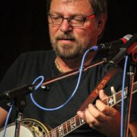 Ron Stewart with Seldom Scene at the August 2018 Gettysburg Bluegrass Festival - photo by Frank Baker 