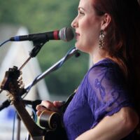Sarah Harris with Trinity River Band at the August 2018 Gettysburg Bluegrass Festival - photo by Frank Baker