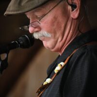 Fred Travers with Seldom Scene at the August 2018 Gettysburg Bluegrass Festival - photo by Frank Baker 