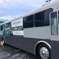 Remington Ryde bus decked out with Storytellers Museum graphics