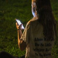 Staying connected at the August 2018 Gettysburg Bluegrass Festival - photo by Frank Baker