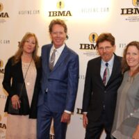 Helen and Nick Forster with Tim O'Brien and Jan Fabricius on the red carpet at the 2018 IBMA Awards - photo © Frank Baker
