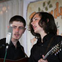 Casey Lewis and Liam Purcell with Cane Mill Road at the 2018 Delaware Valley Bluegrass Festival - photo by Frank Baker