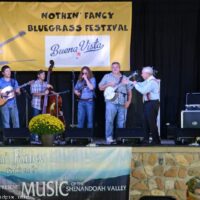 Little Roy Lewis takes over as MC at the Nothin' Fancy Bluegrass Festival - photo © Bill Warren