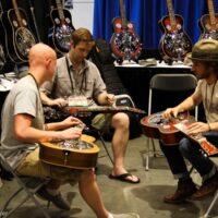 Jamming in the Beard Guitars booth at the 2018 Wold of Bluegrass (9/26/18) - photo by Frank Baker