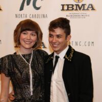 Molly Tuttle and Tristan Scroggins on the red carpet at the 2018 IBMA Awards - photo © Frank Baker