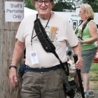 Intrepid bluegrass photographer Ted Lehmann at the 2018 Delaware Valley Bluegrass Festival - photo by Frank Baker