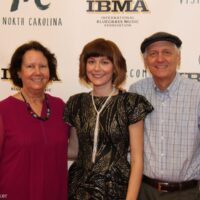 Molly Tuttle with her parents on the red carpet at the 2018 IBMA Awards - photo © Frank Baker