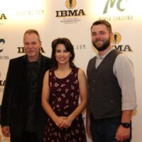 Danny Roberts, Kristin Scott Benson, and John Bryan on the red carpet at the 2018 IBMA Awards - photo © Frank Baker