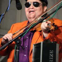 Michael Cleveland having a blast as Elmo Otto with Red Knuckles & The Trailblazers at the 2018 Delaware Valley Bluegrass Festival - photo by Frank Baker