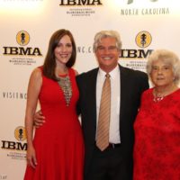 Jerry Salley poses with his wife and his mom on the red carpet at the 2018 IBMA Awards - photo © Frank Baker