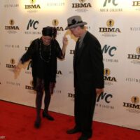 Eileen and Mark Schatz dance on the red carpet at the 2018 IBMA Awards - photo © Frank Baker
