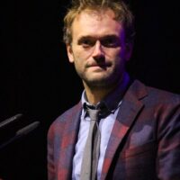 Chris Thile accepts his Distinguished Achievement Award at the 2018 IBMA Special Awards - photo © Frank Baker