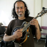 Diptanshu Roy with David Grisman's mandolin