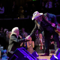 Ricky Skaggs thanking Chris Stapleton at the Country Music Hall of Fame (10/21/18) - photo by Jason Kempin/Getty Images