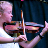 Elizabeth Merritt competes in the 2018 Oklahoma State Picking and Fiddling Championship - photo by Pamm Tucker