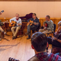 Scott Nygaard leads the guitars at the initial Ashoken Bluegrass Camp - photo by Stewart Dean