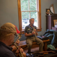 Marv Reitz takes a lap on clarinet as Tom Mindte and Tom Jarboe support.  Tom Mindte, Rodger Nelson & Steve Benedik’s Fall Pickin’ Party, held this year in Woodbine, MD. 6 - 7 October, 2018. Photo by Jeromie Stephens