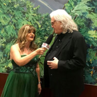 Cindy Baucom interviews Ricky Skaggs at his IBMA Bluegrass Hall of Fame induction in 2018