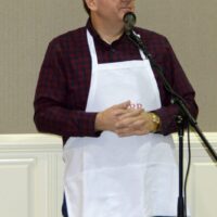 Joe Mullins speaks during the fundraising breakfast at the November 2018 SOIMF - photo © Bill Warren