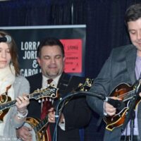 Leaana Price Napier joins her husband, Scott, with the Dean Osborne Band for a twin mandolin piece at 2018 Bluegrass Christmas in the Smokies - photo © Bill Warren
