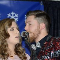Alyssa and Wayne Brewer sing with Gary Brewer & The Kentucky Ramblers at the 2018 Bluegrass Christmas in the Smokies - photo © Bill Warren