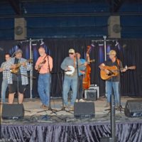 Promoter Ernie Evans joins Keith Bass and Friends of Yee Haw at the 2019 Yee Haw Music Fest - photo © Bill Warren