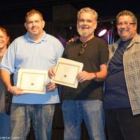 Josh Griffin and Larry Payton accept the Sound Technician award from Debi and Ernie Evans at the 2019 Yee Haw Music Fest - photo © Bill Warren