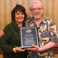 Cecil Tinnon and his wife with his father, Paul Tinnon's induction award as a Pioneer of Missouri Bluegrass - January 4, 2019