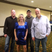 Rhonda Vincent with her snow boots and cocktail dress at Bluegrass in Super Class 2019 - Mitch Meadors, Rhonda Vincent, Kyle Jarvis, and Chris Smith