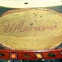 Johnnie Whisnant's etched signature in the eagle banjo rim