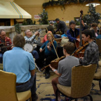 Jamming in the lobby at the 2019 MidWinter Bluegrass Festival - photo by Kevin Slick