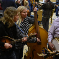 Jamming in the lobby at the 2019 MidWinter Bluegrass Festival - photo by Kevin Slick