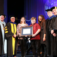 Jim McReynolds is presented with his posthumous Honorary Doctorate of Fine Arts from Glenville State College (2/1/19) - photo by Dustin Crutchfield