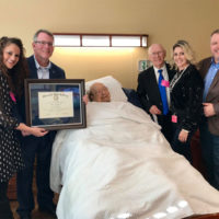 Mac Wiseman is presented with his Honorary Doctorate of Fine Arts from Glenville State College at the Nashville rehab facility where he is recuperating (2/1/19) - photo by Dustin Crutchfield