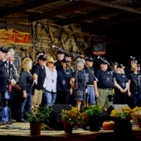 Staff takes a bow at the 2019 Withlacoochee River Bluegrass Festival - photo by Nancy Jordan