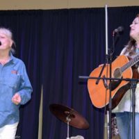 Gail Pike joins Donna Ulisse for a song at the 2019 Spring Sertoma Bluegrass Festival - photo © Bill Warren